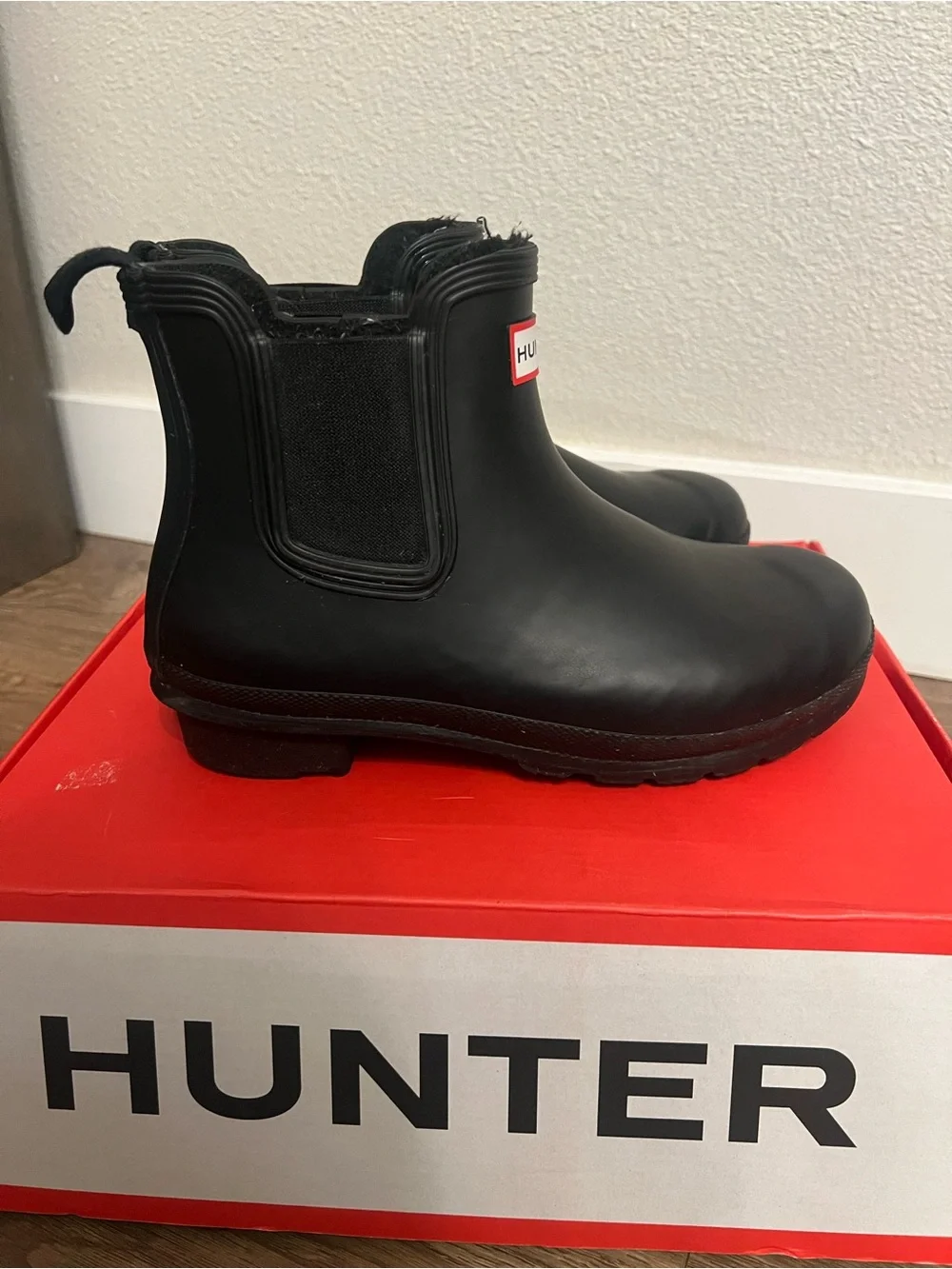 Hunter Women’s Black Chelsea Rain Boots with Red Logo